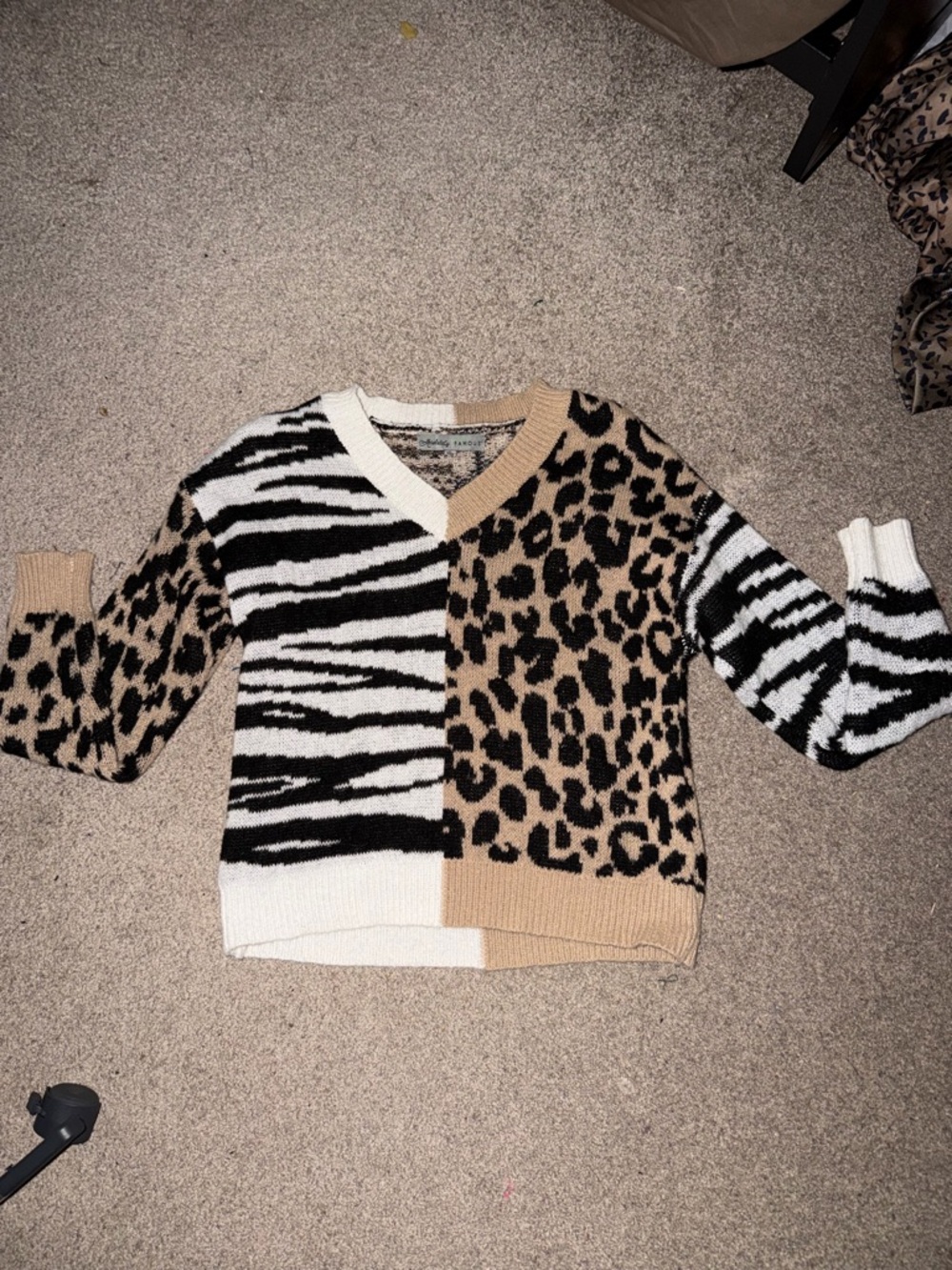 Absolutely Famous Animal Print V-Neck Sweater in Black, White, and Tan